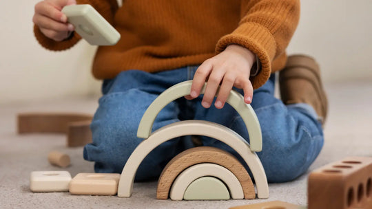 kid playing with eco friendly environmentally friendly wooden toys