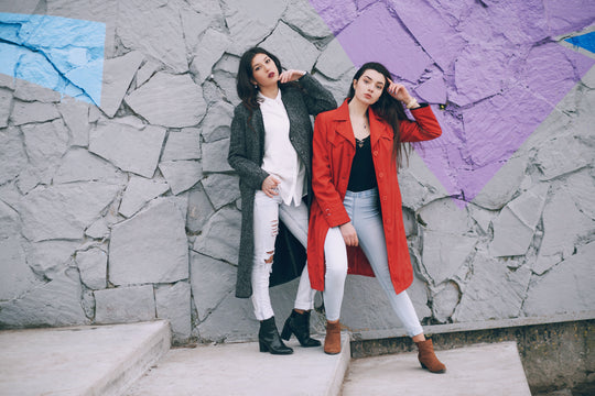 two stylish women posing in winter clothing for winter clothing style ideas