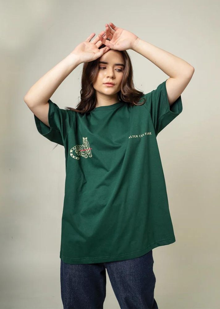 A Model Wearing Green Organic Cotton Green Alter Culture T-Shirt, curated by Only Ethikal