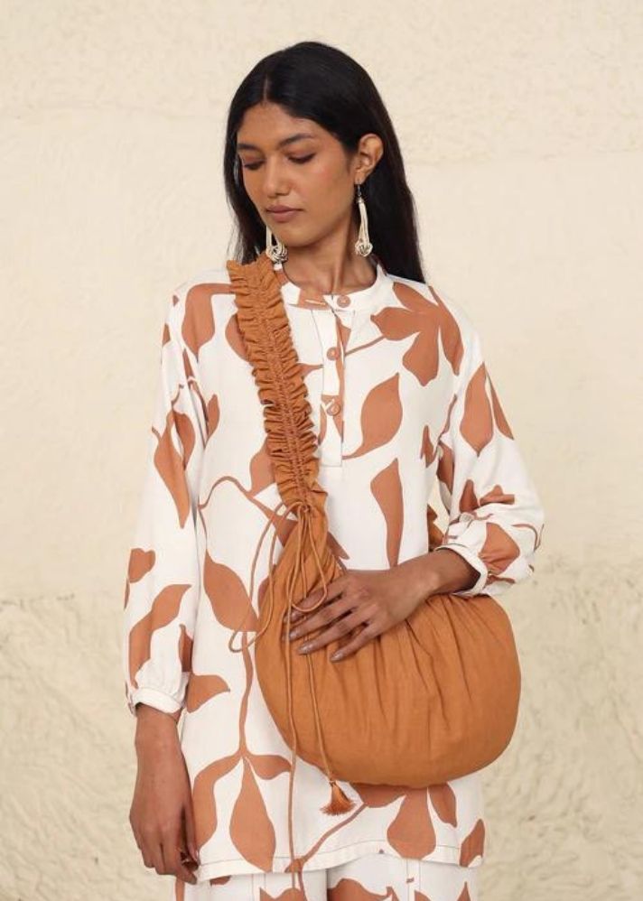 A Model Wearing Beige Cotton Harper Beige Solid Bag, curated by Only Ethikal
