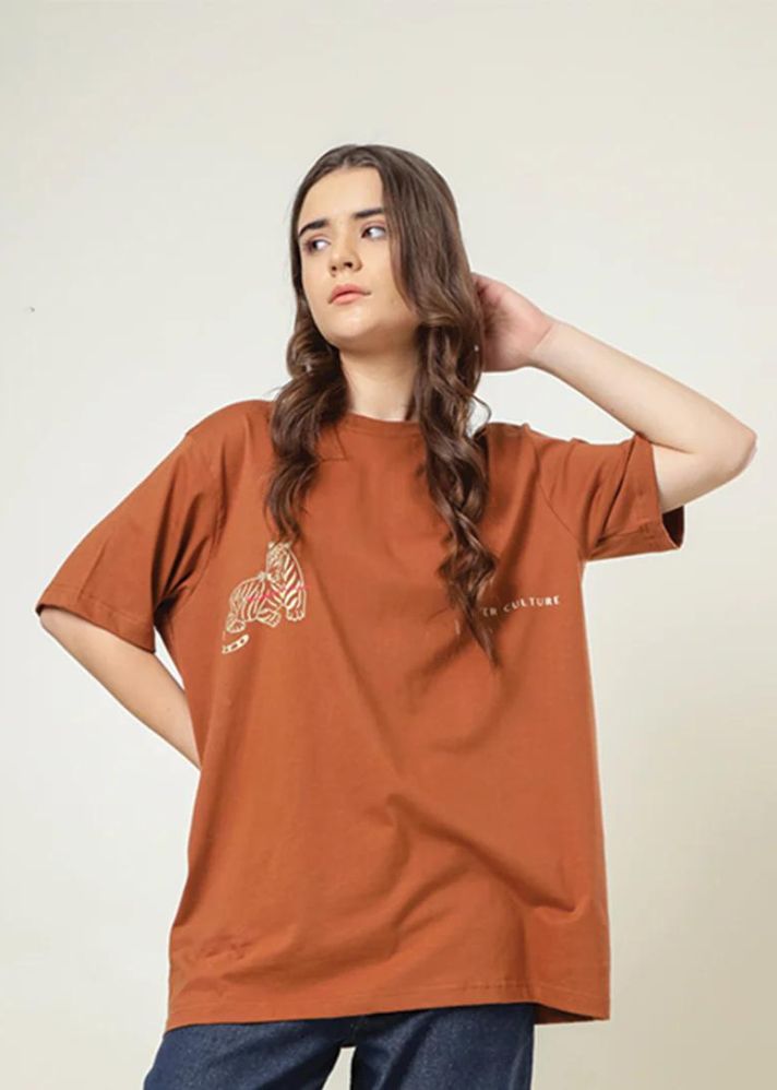 A Model Wearing Orange Organic Cotton Rust Alter Culture T-Shirt, curated by Only Ethikal