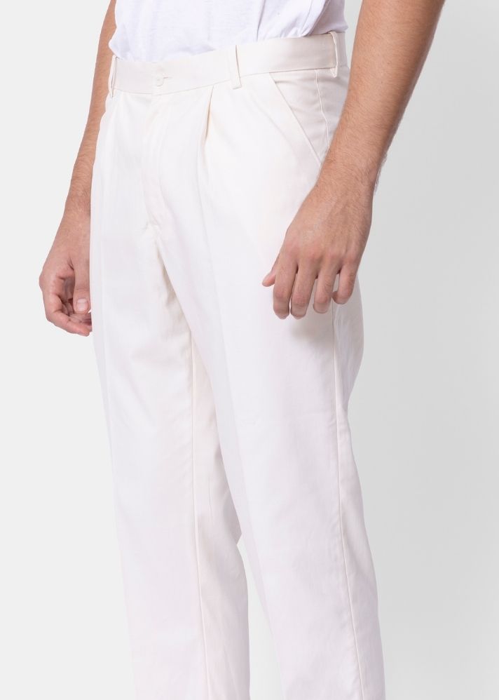A Model Wearing White Pure Cotton THE EDEN TROUSER, curated by Only Ethikal