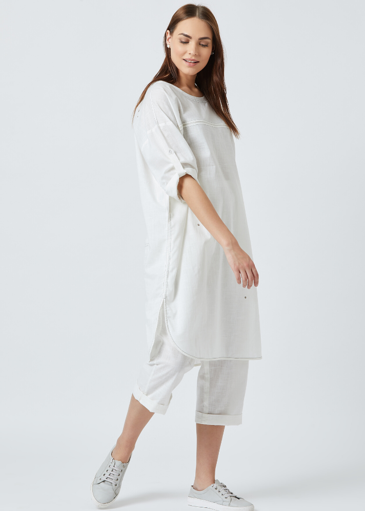young woman in White tunic dress curated by onlyethikal
