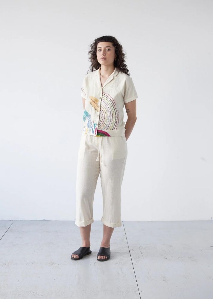 A Model Wearing White Handwoven Cotton Inner child Hand Embellished Shirt, curated by Only Ethikal