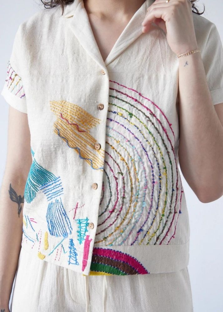 A Model Wearing White Handwoven Cotton Inner child Hand Embellished Shirt, curated by Only Ethikal