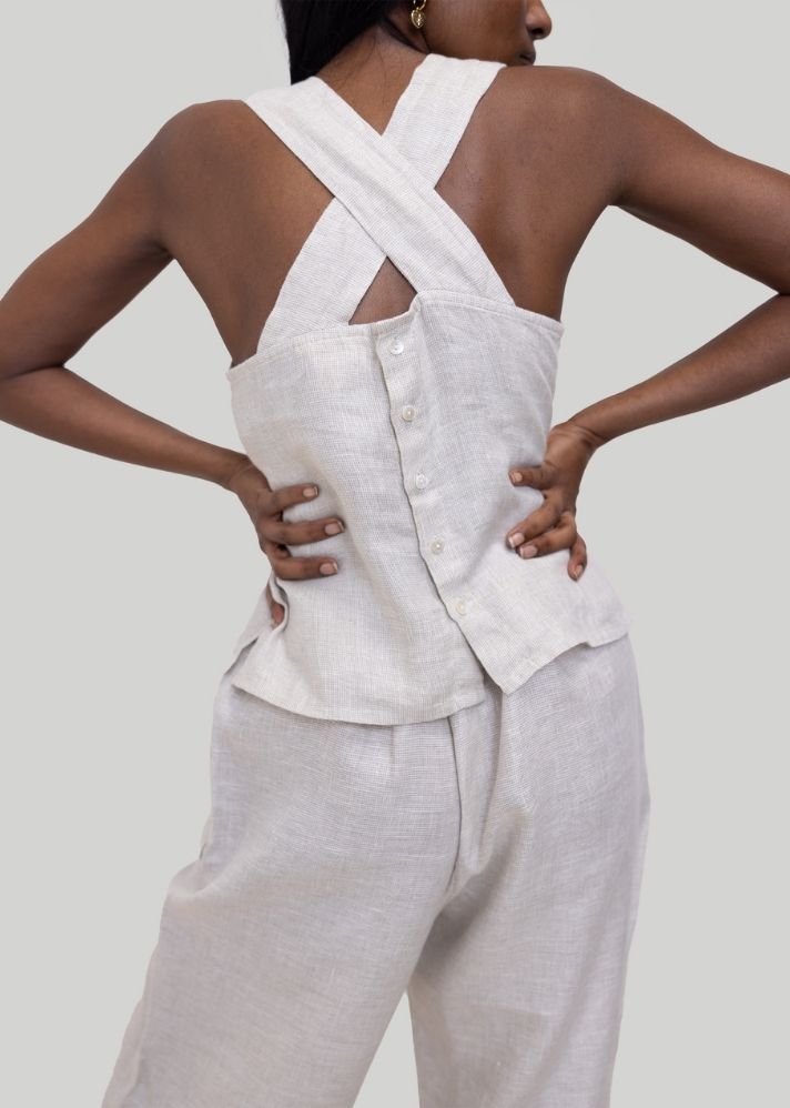 A Model Wearing White Linen Crossback button up tank top White, curated by Only Ethikal