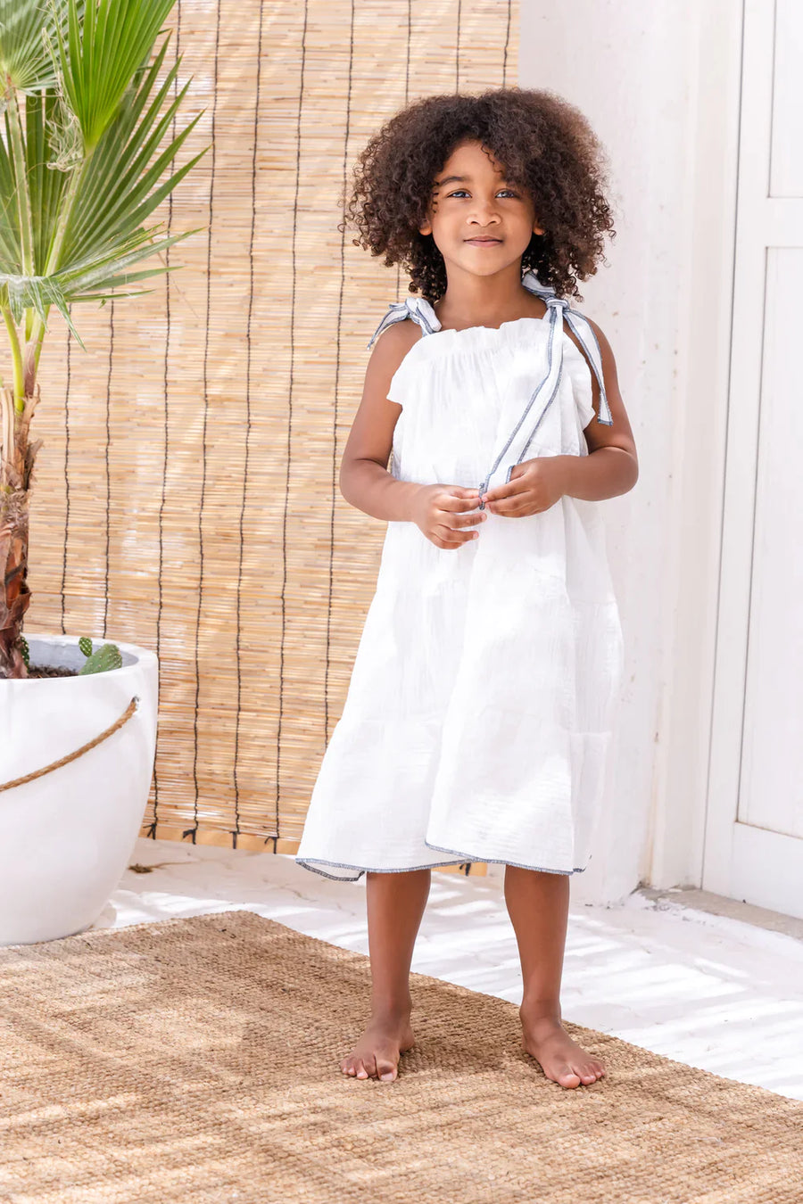 A Model Wearing White Pure Cotton Mia Dress, curated by Only Ethikal
