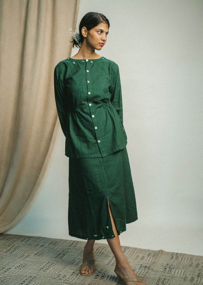 A Model Wearing Green Pure Cotton Rewind Peplum Blouse, curated by Only Ethikal