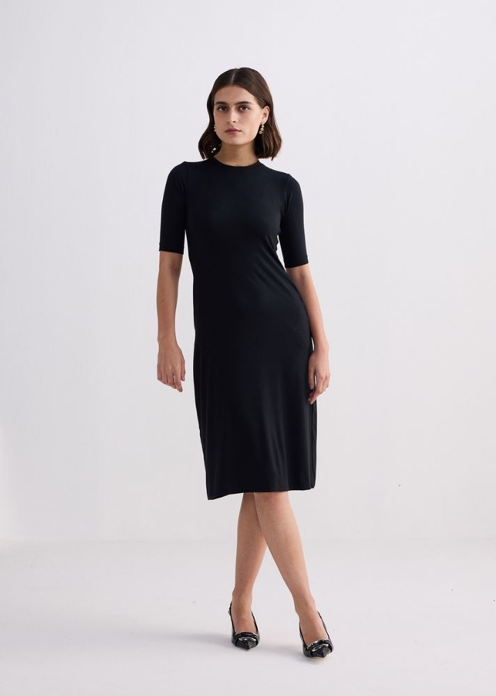 A Model Wearing Black Modal High Crew Neck Elbow Sleeves Fitted Dress In Black
, curated by Only Ethikal