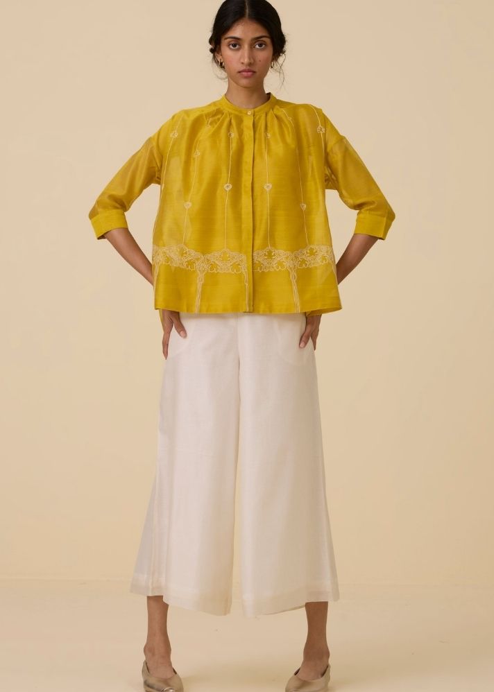 A Model Wearing Yellow Handwoven Cotton Sabeen Handwoven Embroidered Top , curated by Only Ethikal