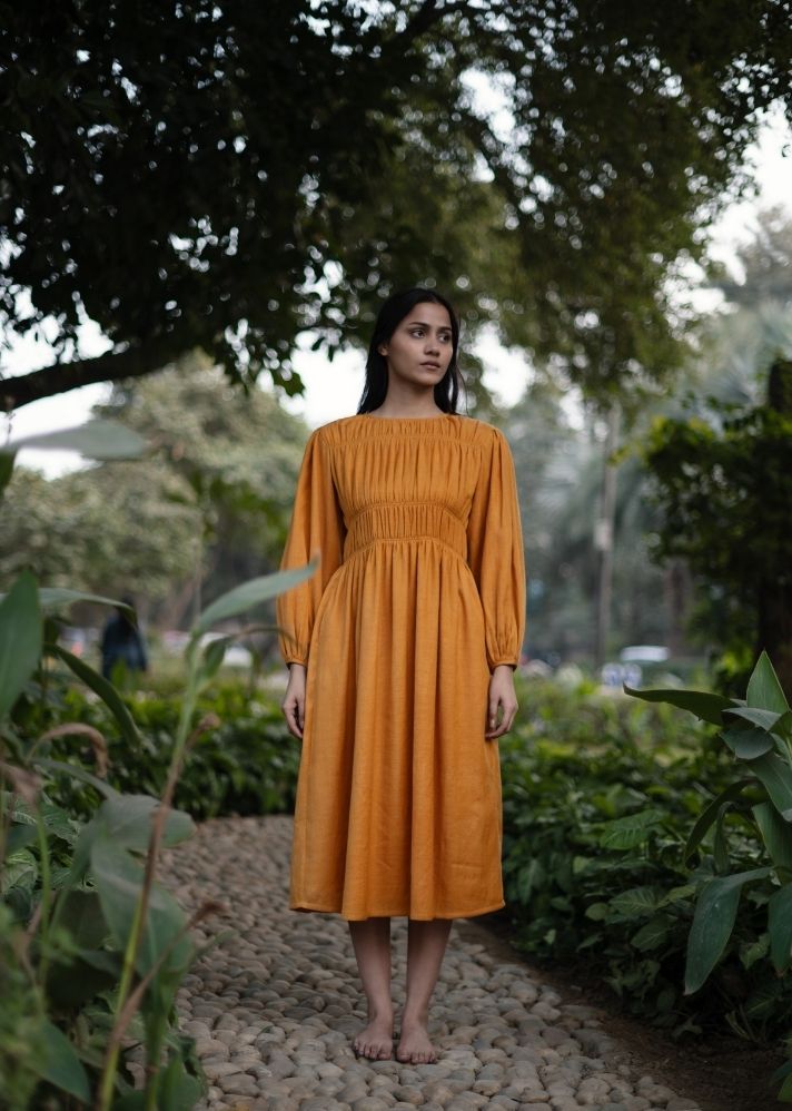 A Model Wearing Yellow Wool Sunflower Dress  , curated by Only Ethikal