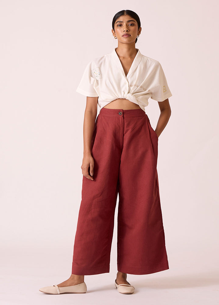 A Model Wearing Red Linen Cotton Chioma Umber Pants, curated by Only Ethikal