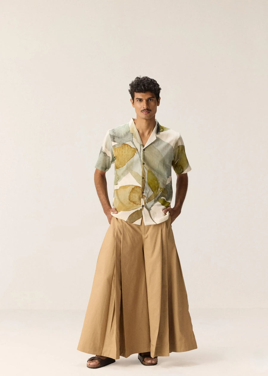 A Model Wearing Off White Cotton Mul Echoes Of Leaves Shirt, curated by Only Ethikal