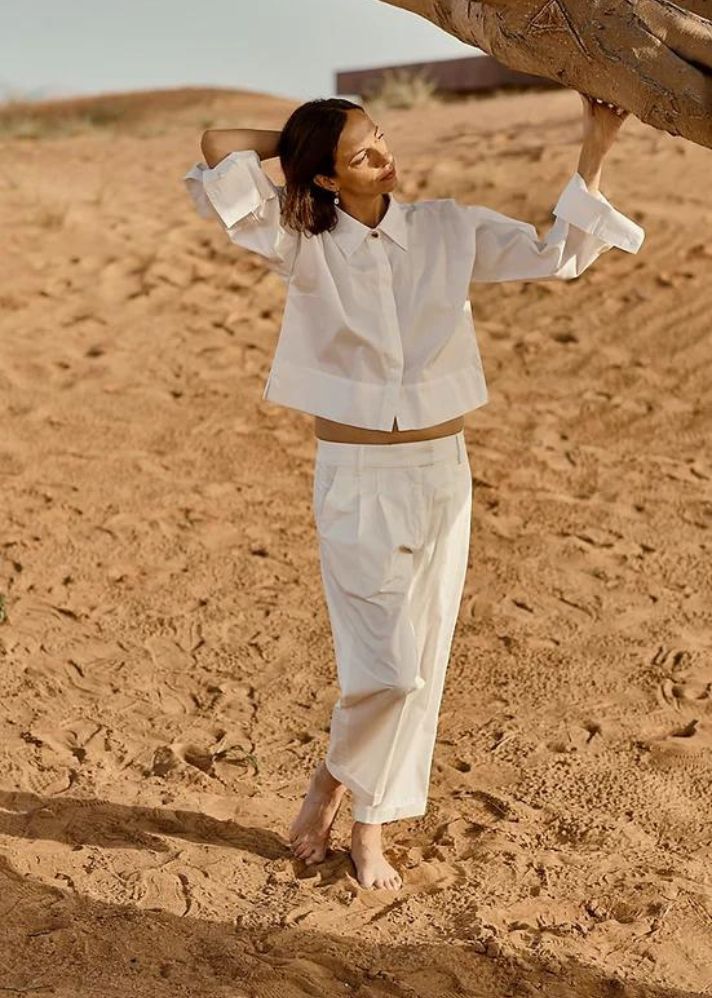 A Model Wearing White Organic Cotton April Barrel- Legged Pants, curated by Only Ethikal