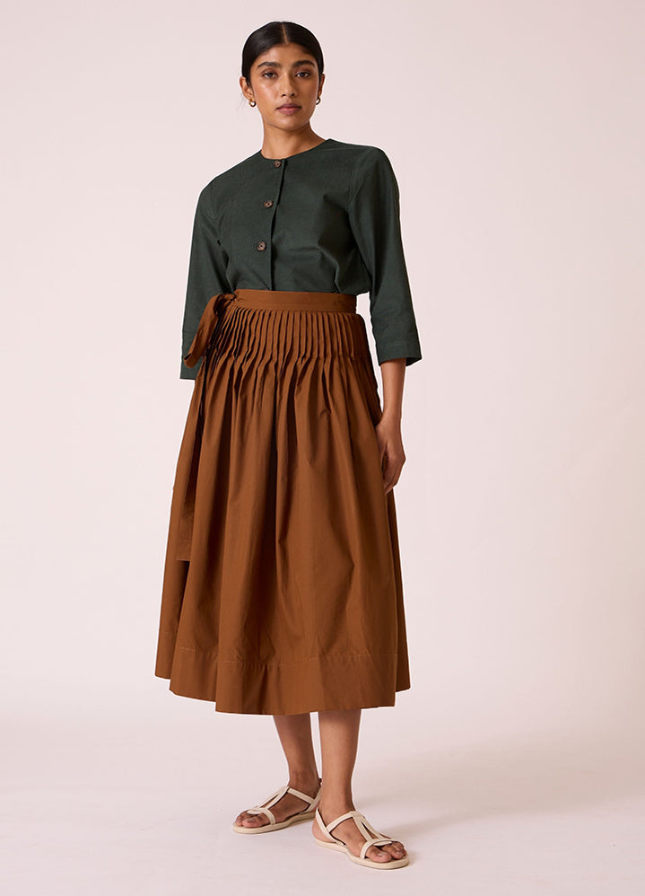 A Model Wearing Brown Poplin Tereza Brown Pleated Wrap Skirt, curated by Only Ethikal