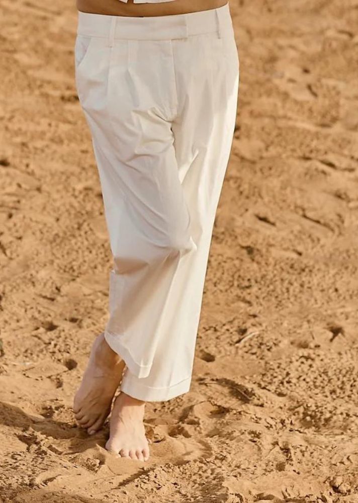 A Model Wearing White Organic Cotton April Barrel- Legged Pants, curated by Only Ethikal