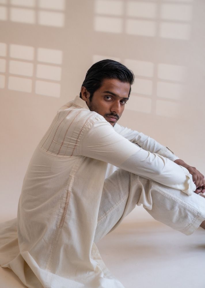 A Model Wearing White Pure Cotton Dawning Unisex Pleated Blazer, curated by Only Ethikal