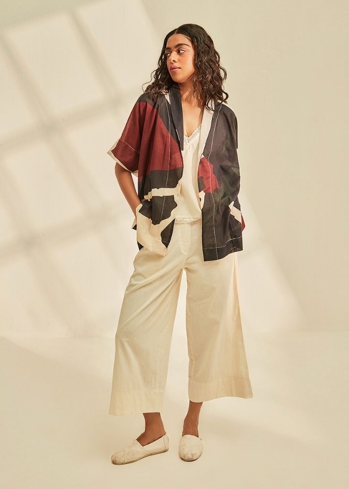 A Model Wearing Black Cotton Mul Aba Cape , curated by Only Ethikal