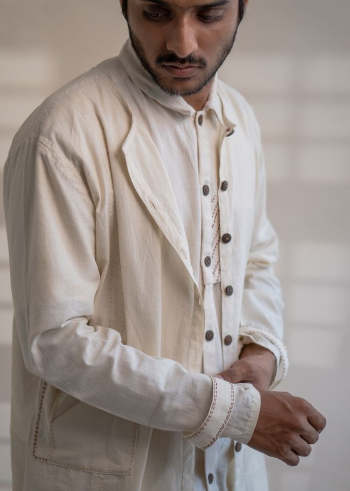 A Model Wearing White Pure Cotton Dawning Unisex Overlay, curated by Only Ethikal
