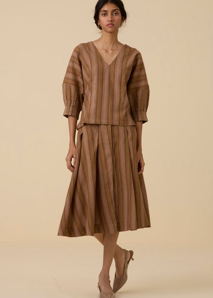 A Model Wearing Brown Handwoven Cotton Faizaan Brown Stripe Pleated Skirt, curated by Only Ethikal