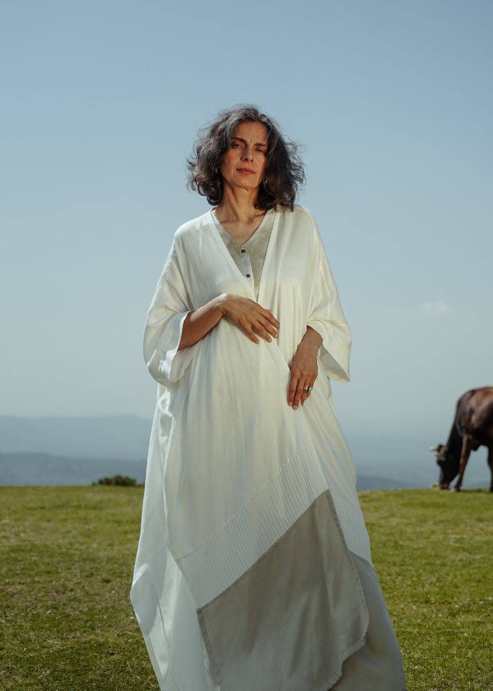 A Model Wearing White Vegan Silk L.09 Color-Blocked Lotus Silk Abaya, curated by Only Ethikal