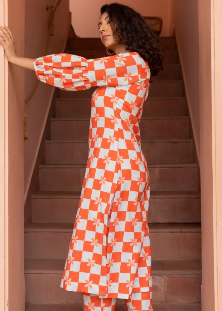 A Model Wearing Multicolor Organic Cotton Bloom Kurta Set- Peach Checks, curated by Only Ethikal