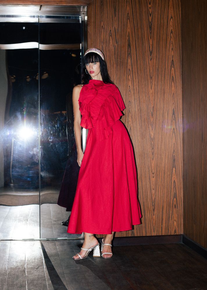 A Model Wearing Red Pure Cotton Lana Side Ruffle Dress, curated by Only Ethikal