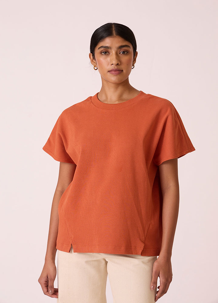 A Model Wearing Orange Organic Cotton Nadia Orange Cotton Vest , curated by Only Ethikal