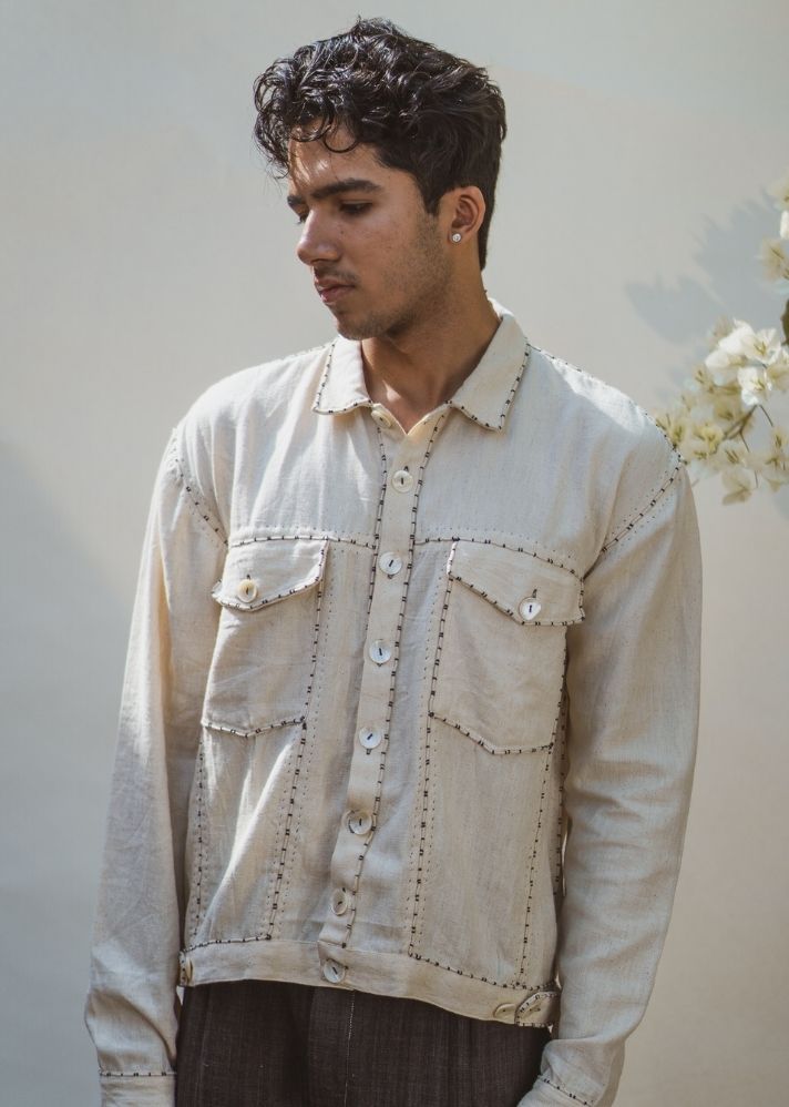 A Model Wearing White Pure Cotton Sonder Unisex Kora Bomber, curated by Only Ethikal