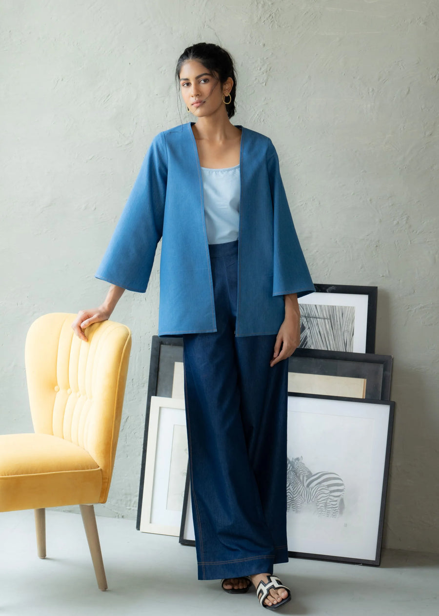 A Model Wearing Blue Denim Heritage Overlay, curated by Only Ethikal