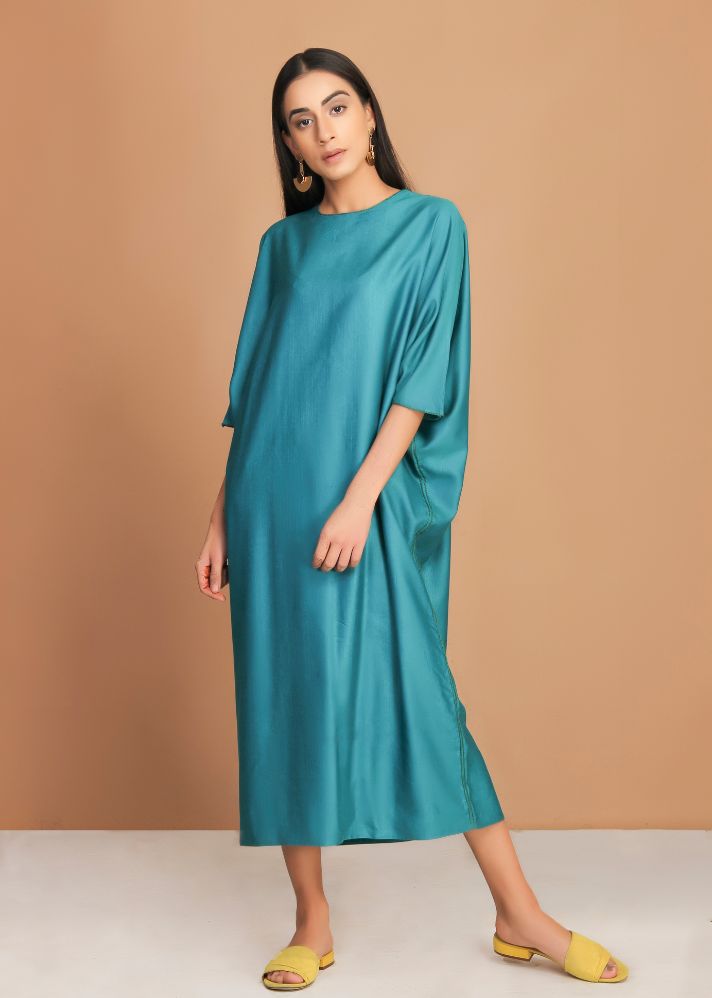 A Model Wearing Green Handloom Cotton Teal Green Roomy Dress
, curated by Only Ethikal