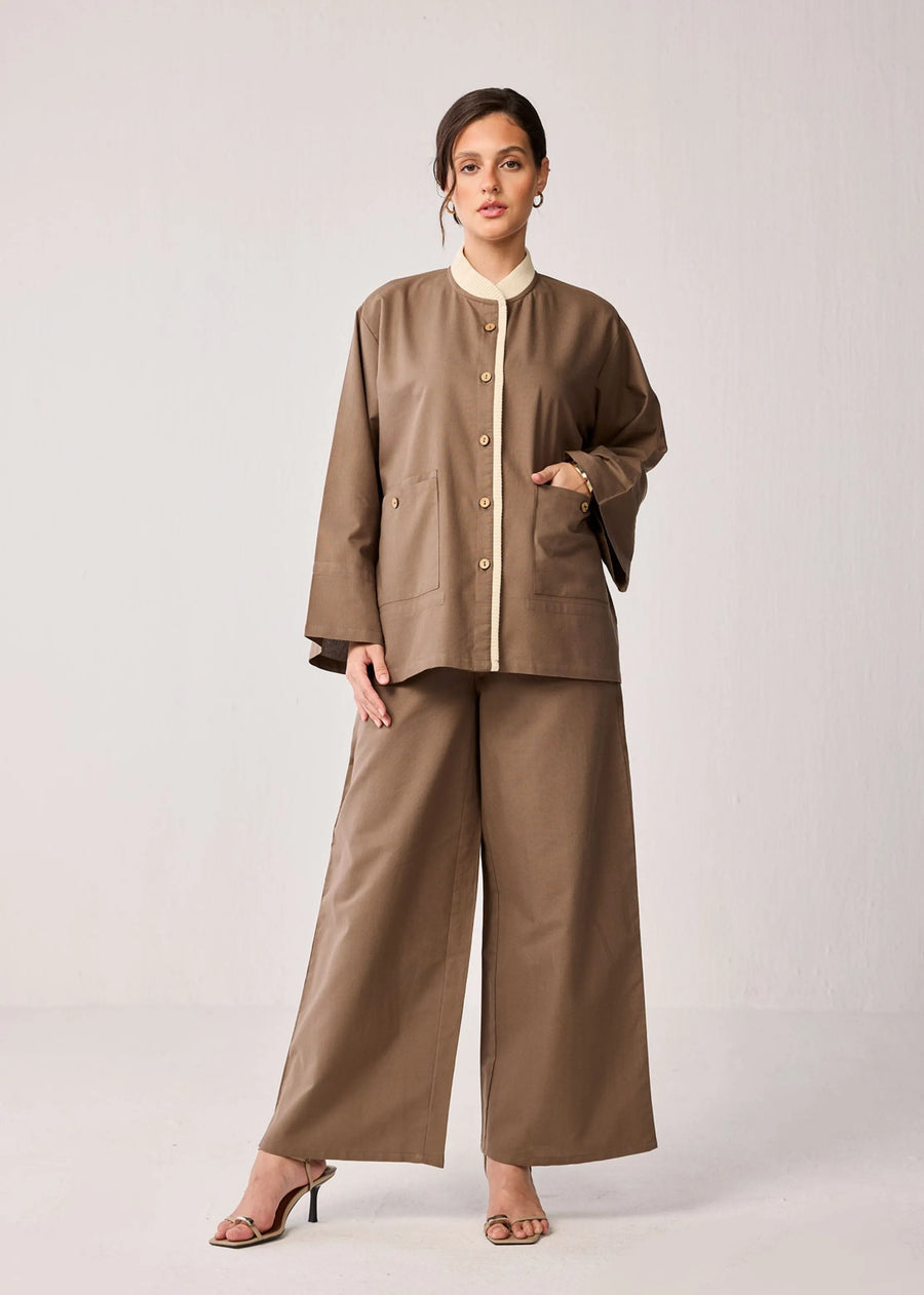 A Model Wearing Brown Pure Cotton Oversized Cotton Jacket With Rib Detail And Flared Sleeves In Brown, curated by Only Ethikal