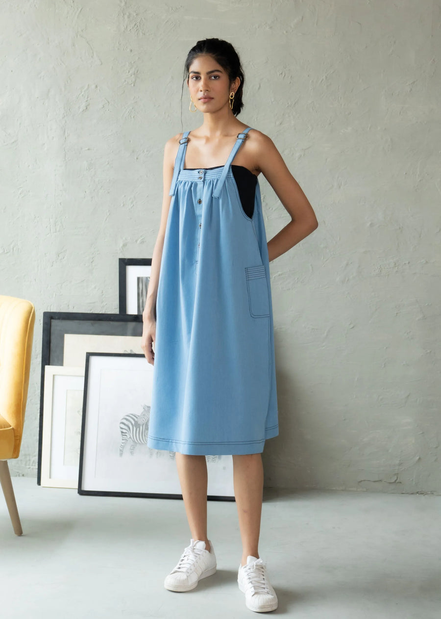 A Model Wearing Blue Denim Pathfinder Suspender Dress, curated by Only Ethikal
