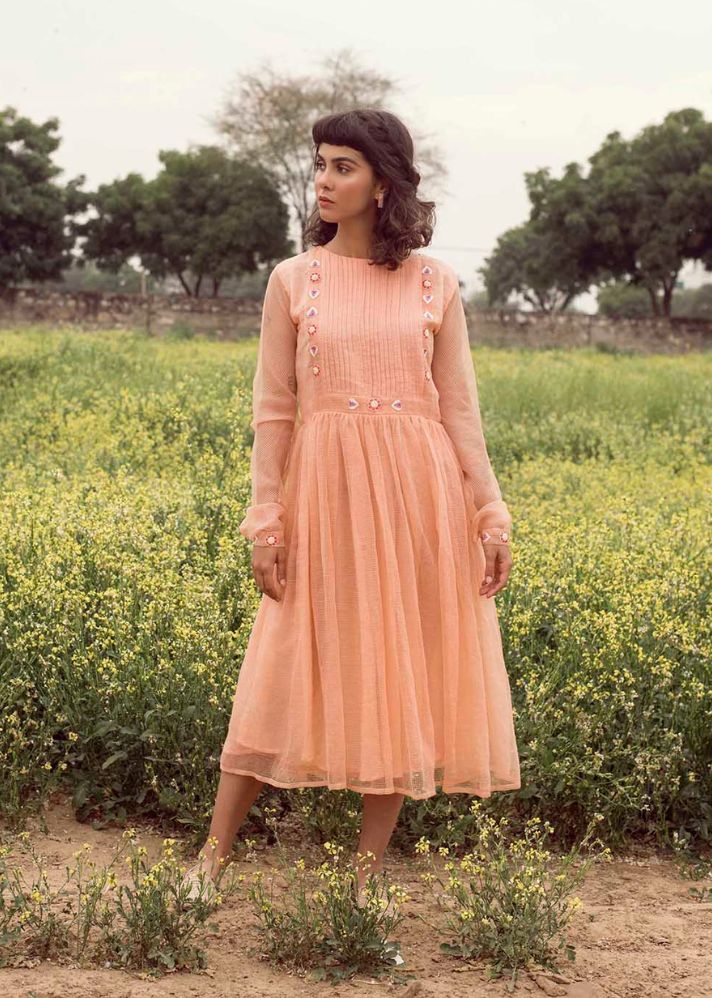 A Model Wearing Peach Handwoven Cotton Summer Chic Dress In Kota Doria, curated by Only Ethikal