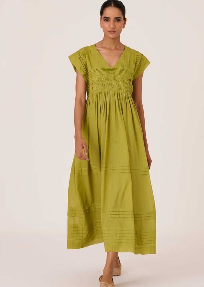 A Model Wearing Green Organic Cotton Aelia Citron Pleated Midi Dress , curated by Only Ethikal