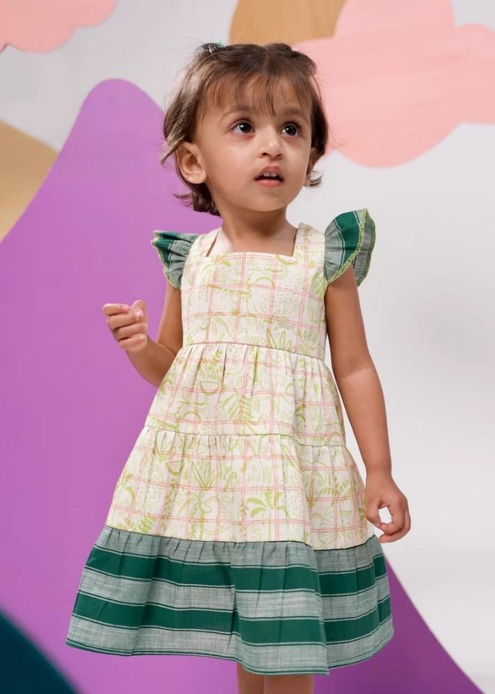 A Model Wearing Multicolor Pure Cotton Jungle Gym Printed Cotton Tiered Dress, curated by Only Ethikal