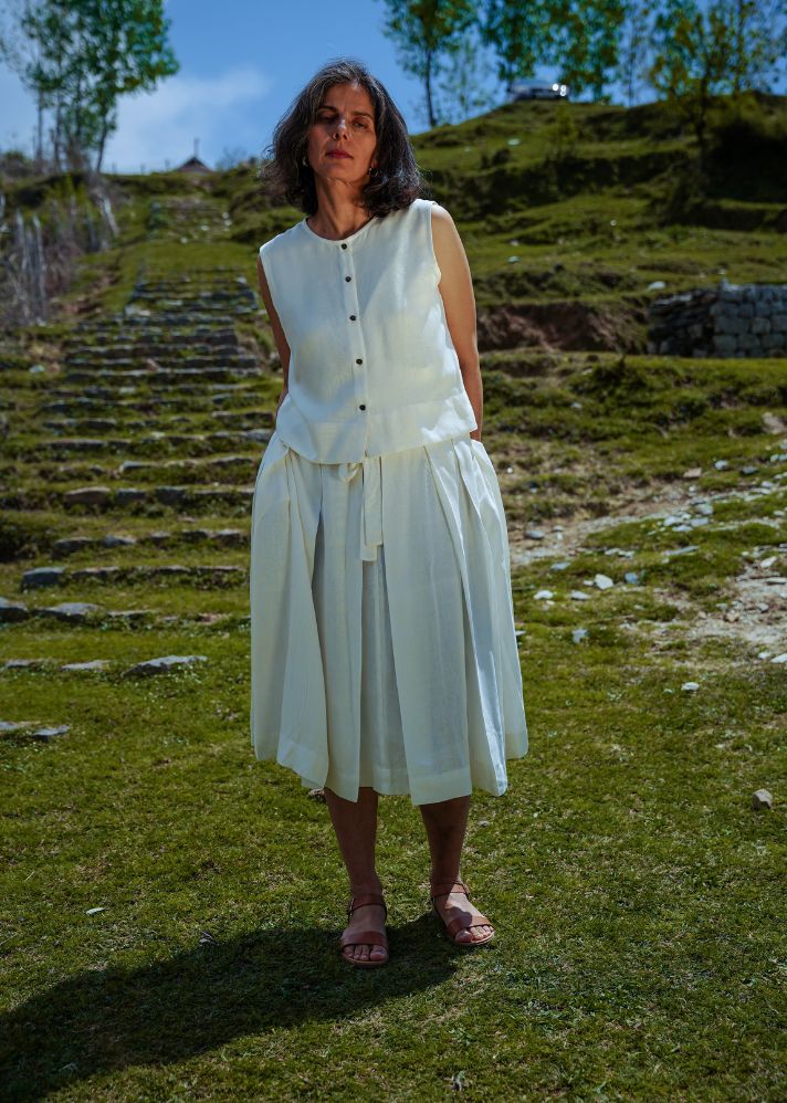 A Model Wearing White Vegan Silk L.11 Relaxed Unisex Lotus Crop Shirt, curated by Only Ethikal