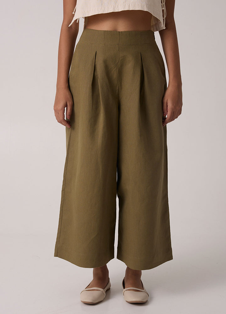 A Model Wearing Olive Linen Cotton Hieke Olive Pants , curated by Only Ethikal