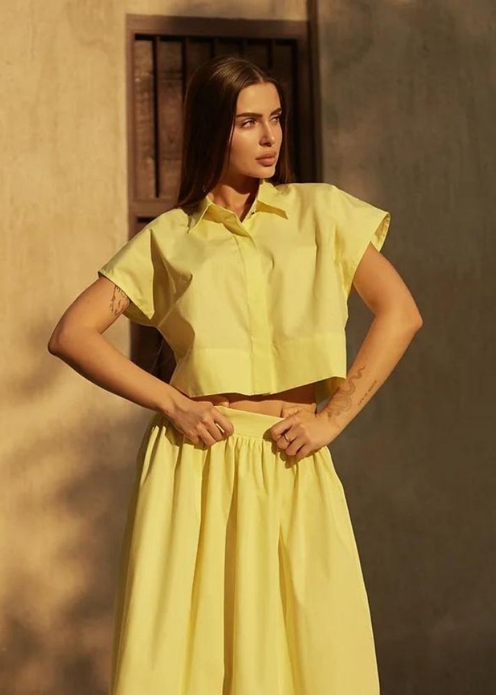 A Model Wearing Yellow Organic Cotton Aafra Shirt, curated by Only Ethikal