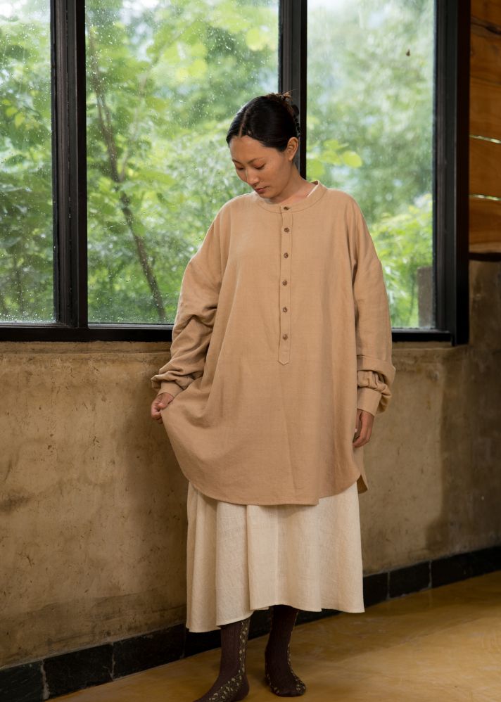 A Model Wearing Brown Vegan Silk Kc.10 Oversized Breezy Kala Cotton Shirt, curated by Only Ethikal