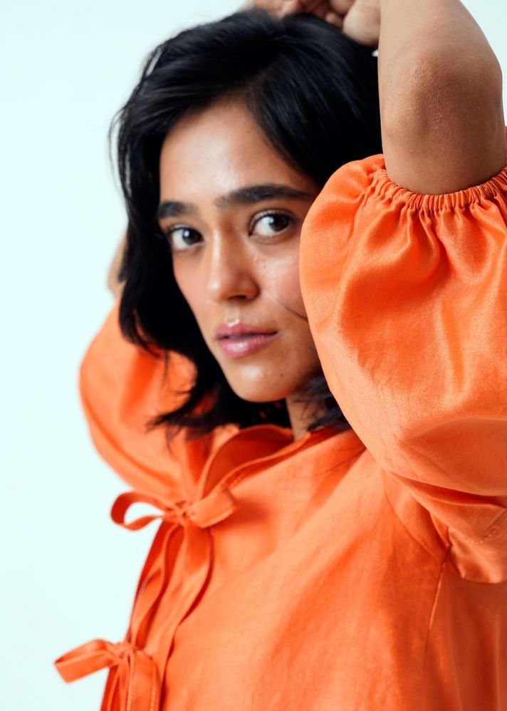 A Model Wearing Orange Handloom Chanderi Toni Top, curated by Only Ethikal