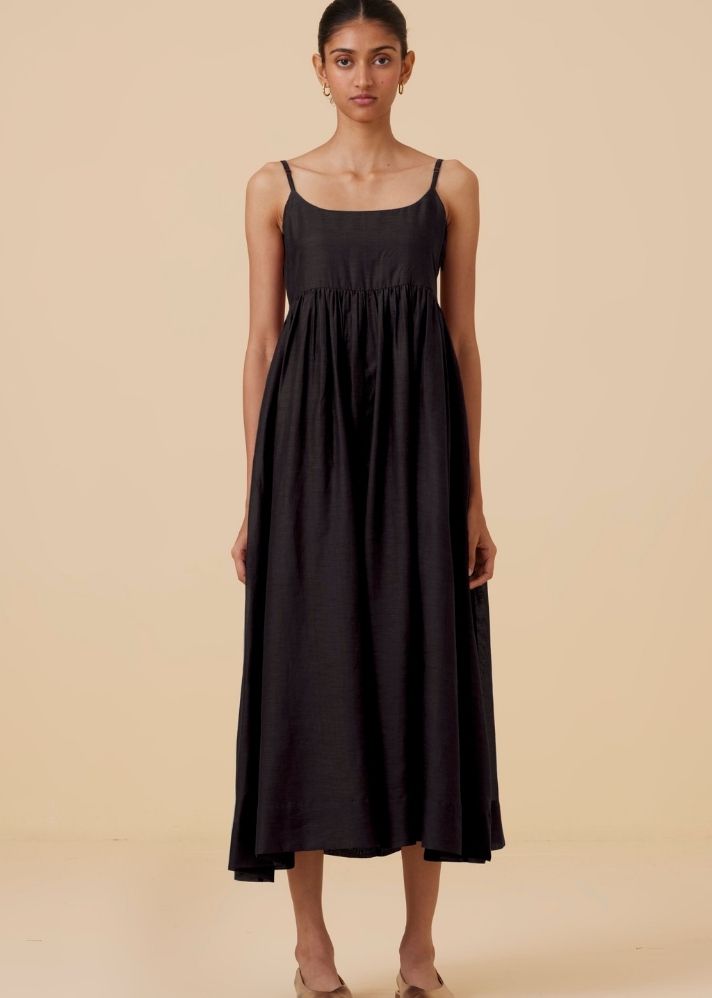 A Model Wearing Black Cotton Silk Hamza Black Sleeveless Dress , curated by Only Ethikal