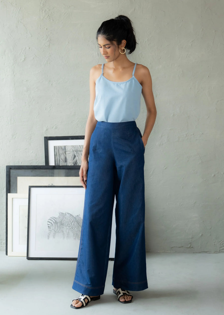 A Model Wearing Blue Denim Heritage Strap Top, curated by Only Ethikal