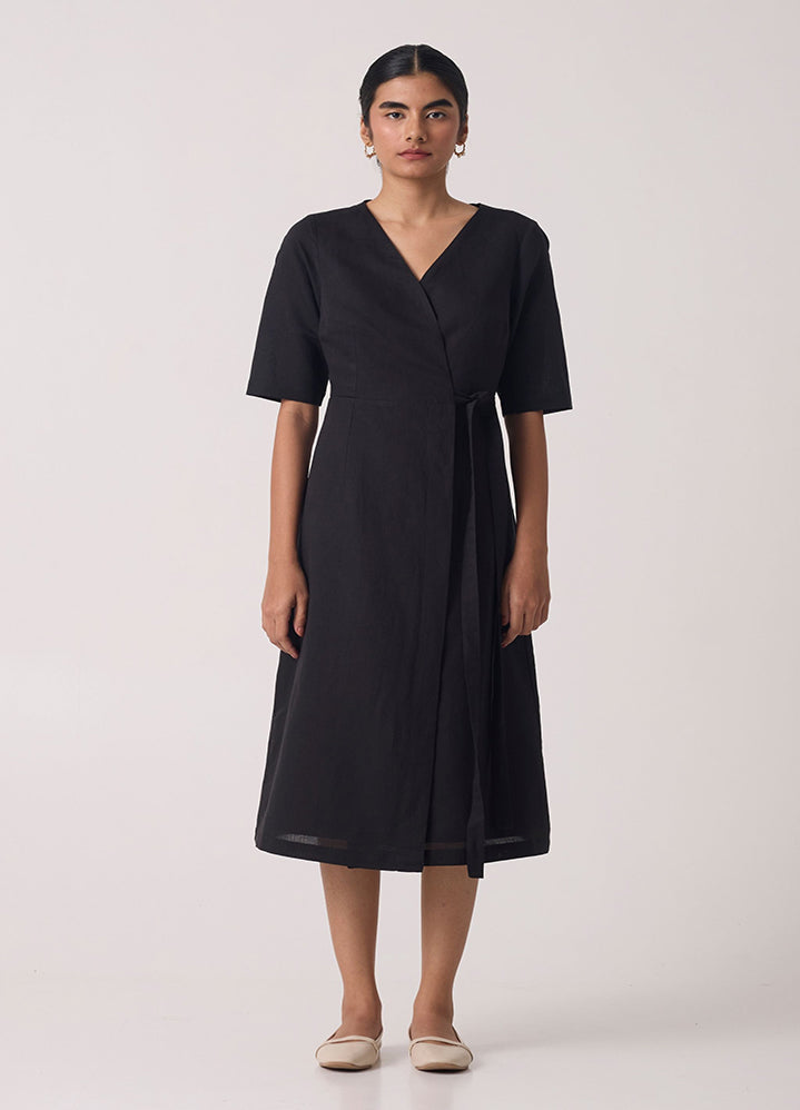 A Model Wearing Black Linen Cotton Arandi Black Wrap Dress With Sleeves , curated by Only Ethikal