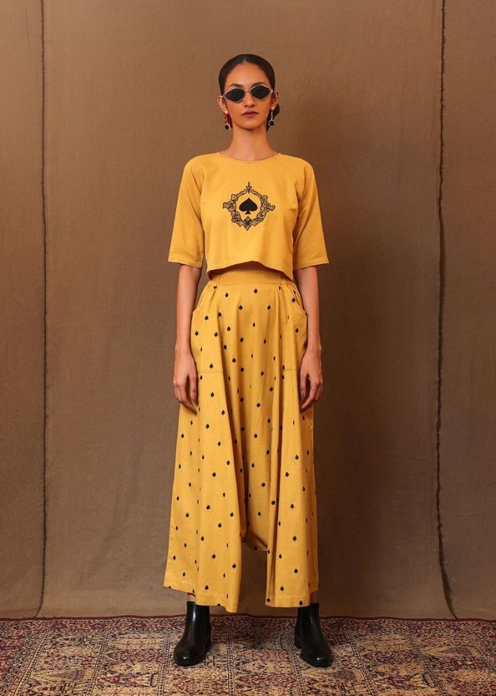 A Model Wearing Yellow Pure Cotton Mustard Spade Emb Harem Pants, curated by Only Ethikal