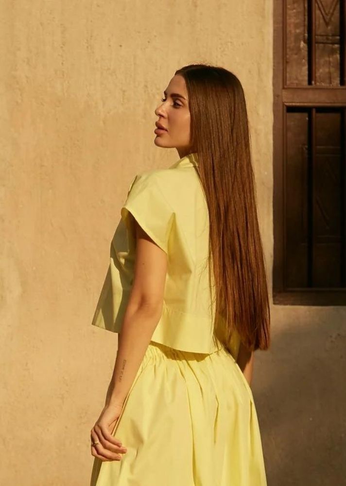 A Model Wearing Yellow Organic Cotton Aafra Shirt, curated by Only Ethikal