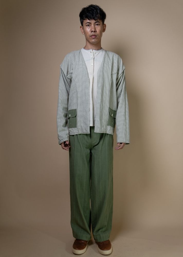A Model Wearing Olive Pure Cotton Meadows Unisex Reversible Jacket, curated by Only Ethikal