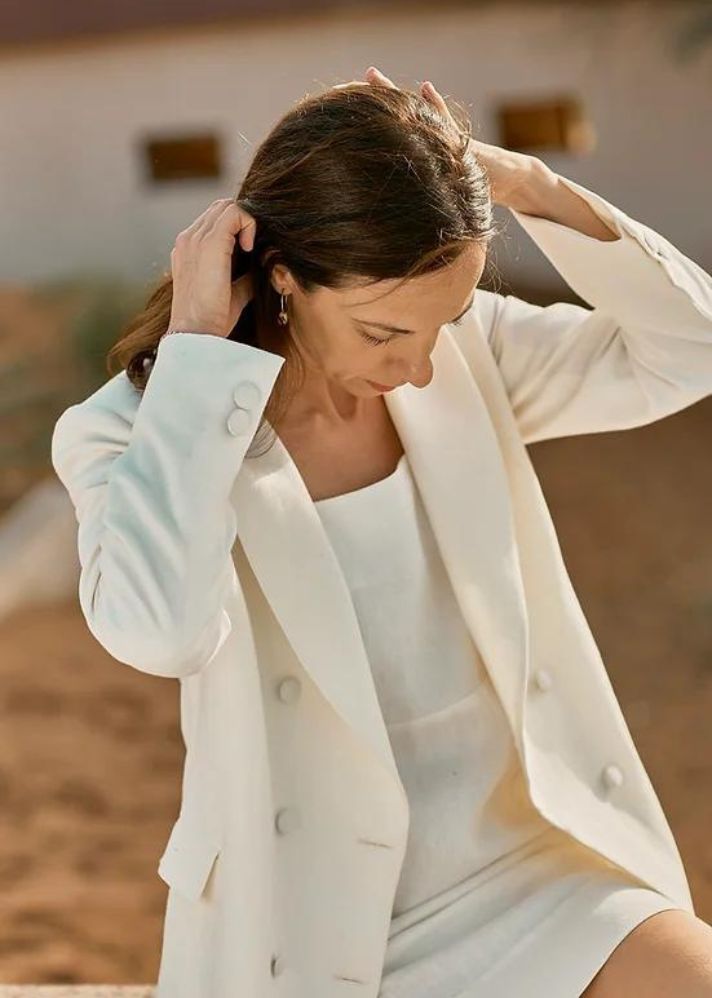 A Model Wearing White Linen Alivia Off White Dress, curated by Only Ethikal