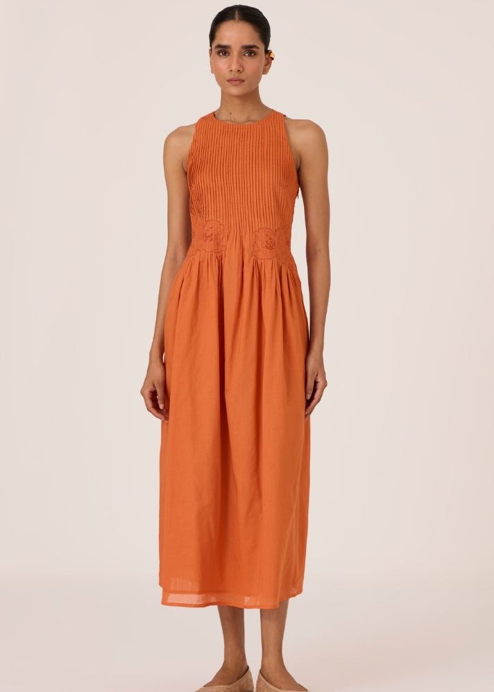 A Model Wearing Orange Organic Cotton Amani Apricot Embroidered Dress , curated by Only Ethikal