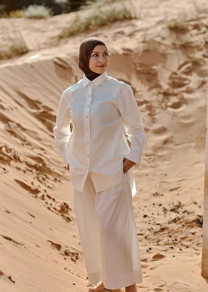 A Model Wearing White Organic Cotton Ali Pants, curated by Only Ethikal